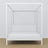 Lit double blanc avec baldaquin – angle du cadre en bois, gros plan