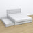 Doppelbett mit Schublade aus Holz grau – geöffnete Schublade, geräumiges Inneres